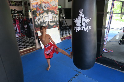 Local Kids training among our guests at Combat 360X Muay Thai, MMA and Fitness Camp in Khao Lak, Thailand